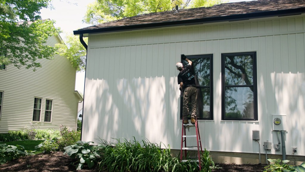 Energy Efficient Windows Window installer done replacing an old window
